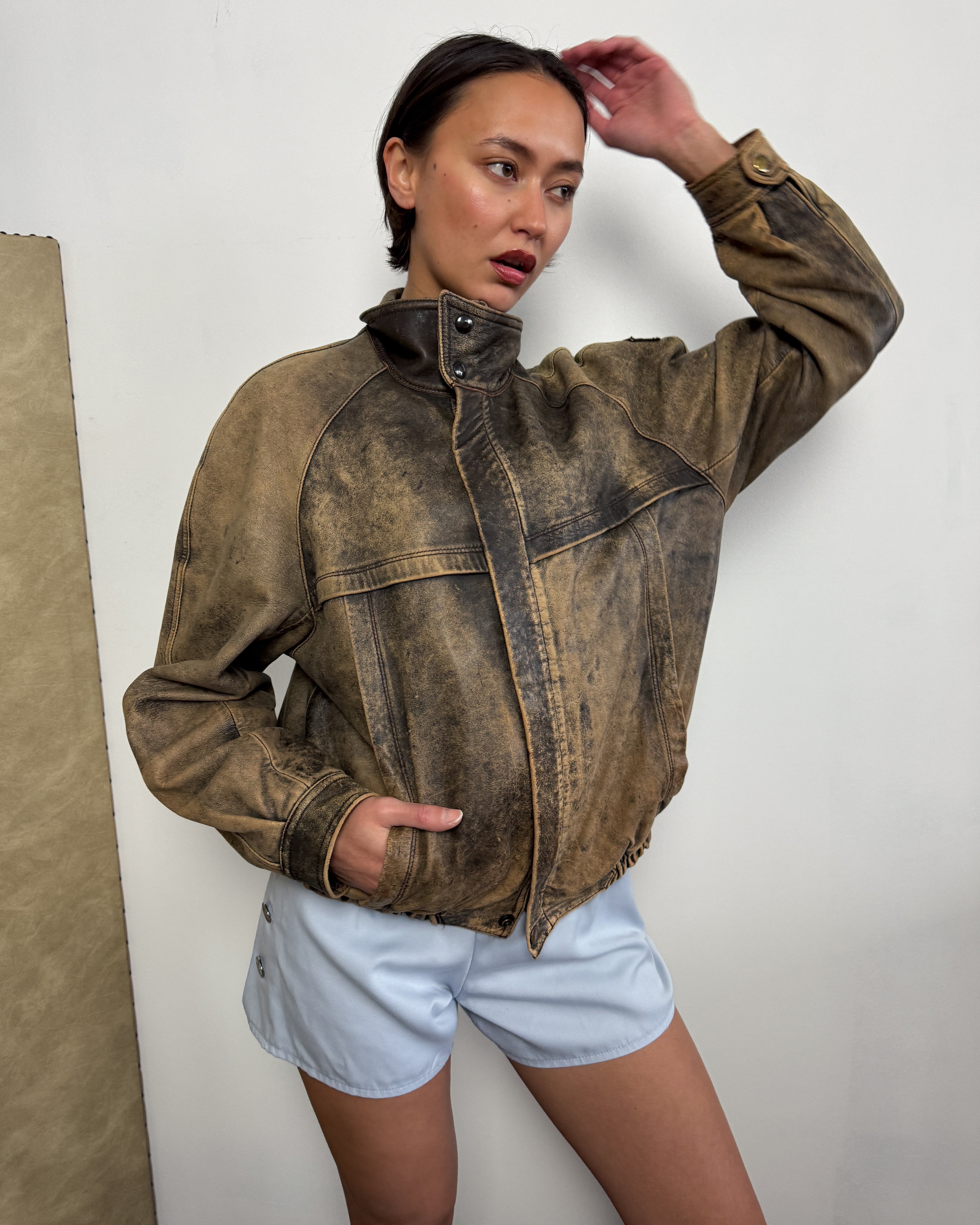 Distressed oversized vintage brown leather jacket